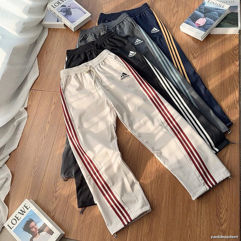 Adidas Three-Stripe Side Panels And An Easy Athletic Cut Striped Track Pants for daily