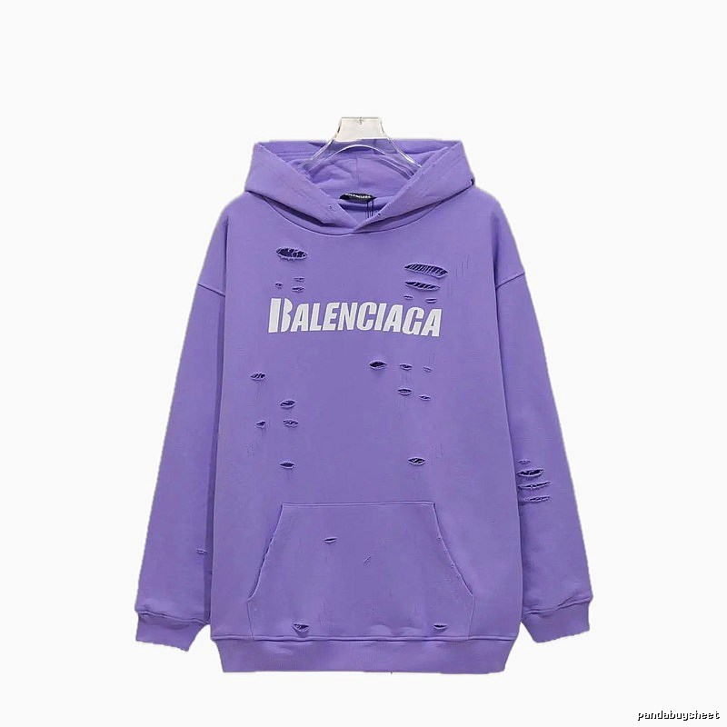 Balenciaga's ripped purple sweatshirt