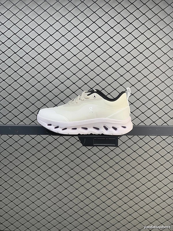 On Cloud Runners in White and Black, Finished with Layered Mesh Upper